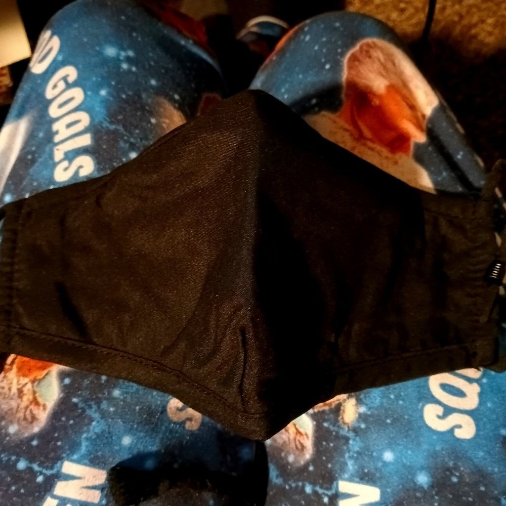 black cloth with an inter pocket mask